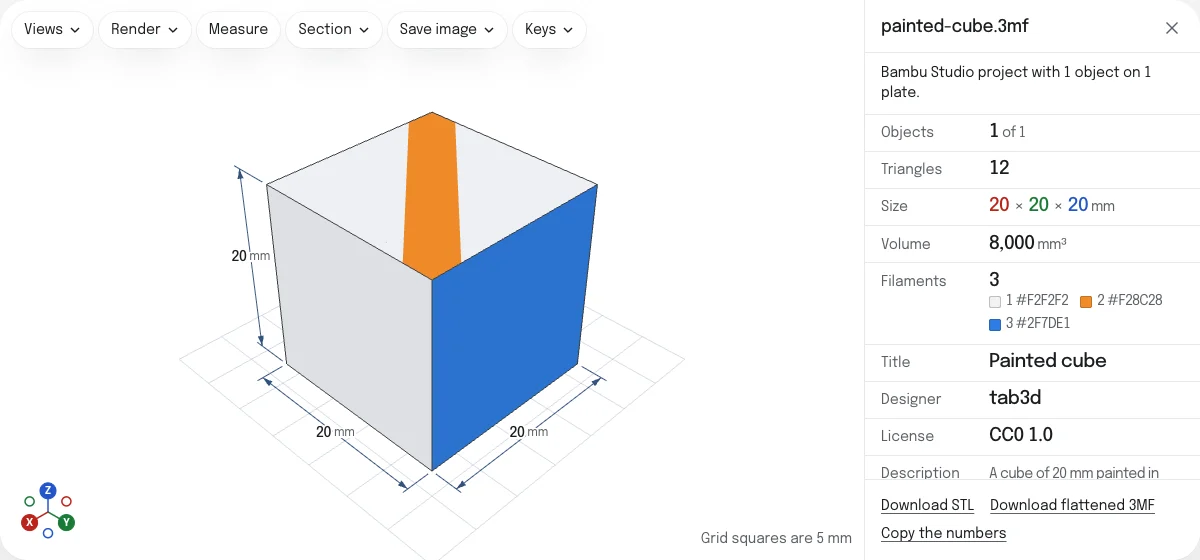 The 3MF viewer with a painted cube open: white, with an orange stripe painted across its top and its back in blue, its three filaments with their colors, and the project's title, designer and license.